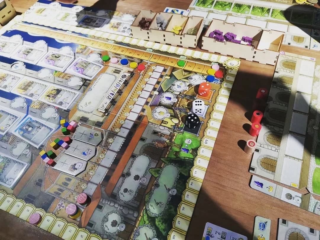 Close-up of a strategy board game in play on a wooden table
