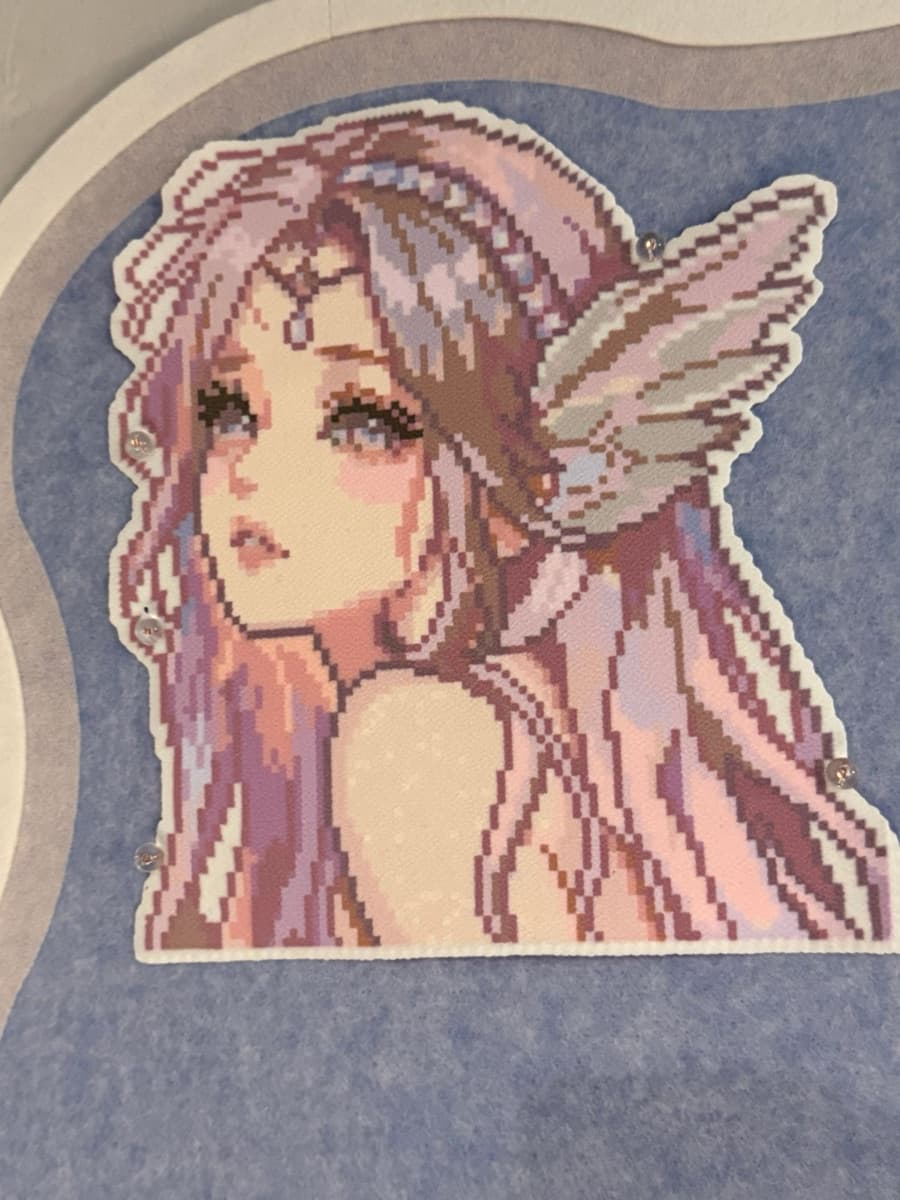 Large pixel-art portrait of a winged girl in soft pink and lavender beads