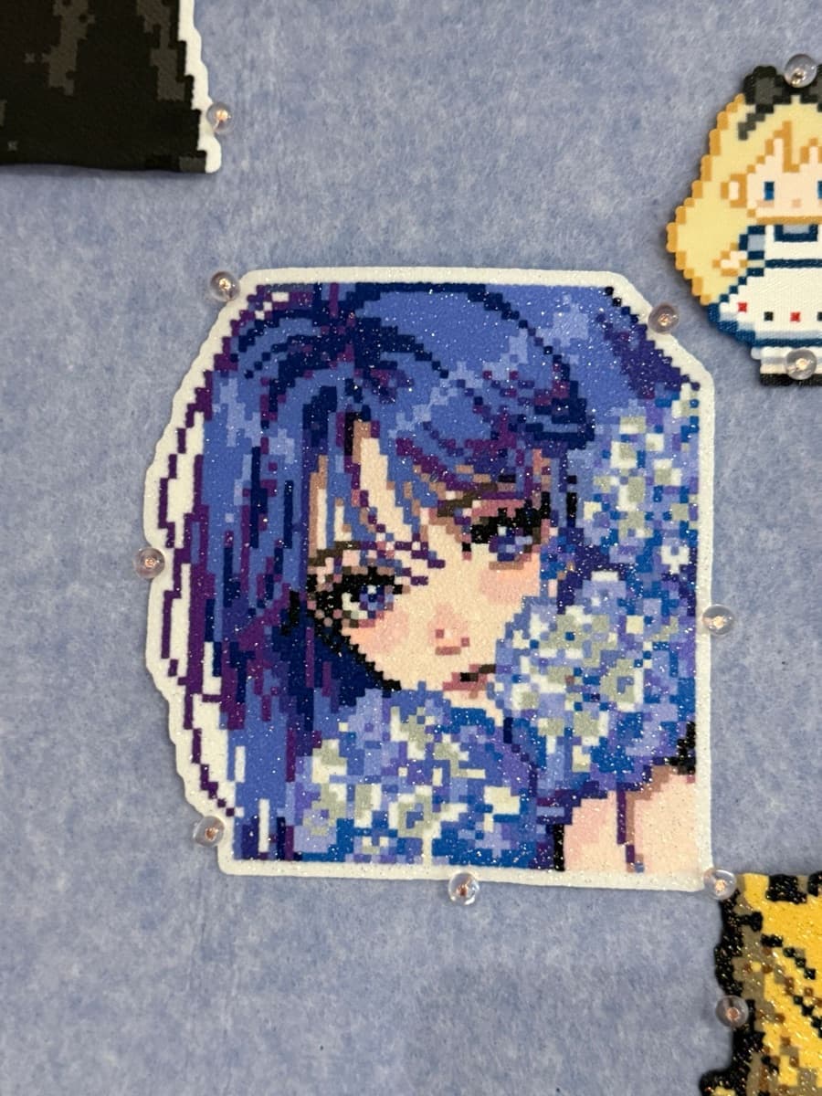 Glitter-bead pixel portrait of a blue-haired girl with hydrangea flowers